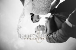 Black-and-white overhead close-up of wedding details.