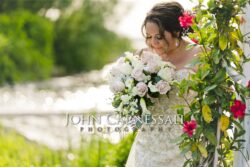 Bride holding her bouquet during an outdoor portrait.