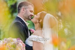 Bride and groom embracing in a close-up portrait