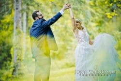 Groom and Bride dancing in the wooded setting at Springside Inn Auburn NY
