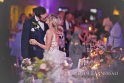 Bride and Groom Kissing at their wedding reception at the Springside Inn in Auburn NY