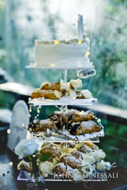 Wedding cake and desserts arranged on a display table