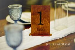 Wooden table number on a reception table