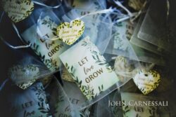 Wedding details and stationery arranged in a flat lay